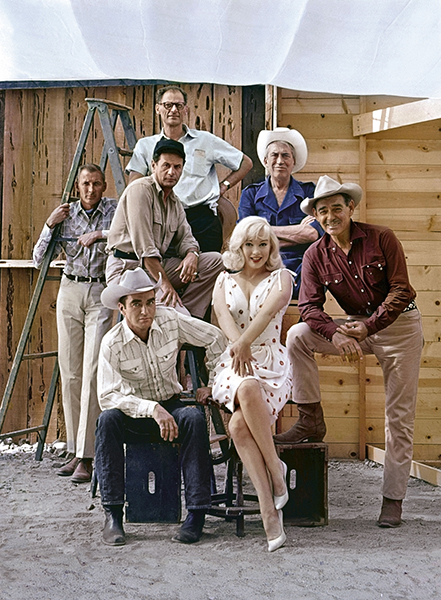 USA. Reno, Nevada. 1960. The Misfits group shot (Color version). Front row from left to right: Montgomery Clift, Marilyn Monroe, Clark Gable
